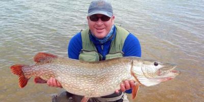 Philip Jordan 27lb Pike from Pistford Water on the fly.jpg